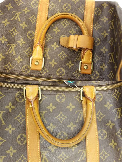 lv prism keepall bandouliere duffle|louis vuitton keepalls.